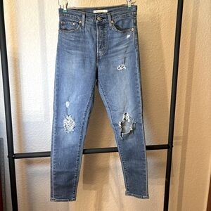 Levi’s Wedgie Skinny Button Fly Size 26. Intentional distress and holes.